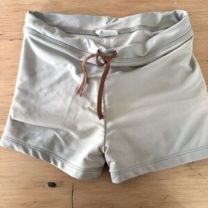 June Park size 7 boy swim shorts. Faded blue color with brown drawstring.